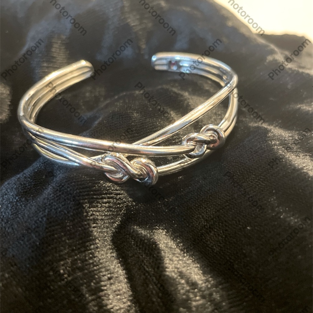 Elle Sterling Silver Infiniti Bangle Bracelet.